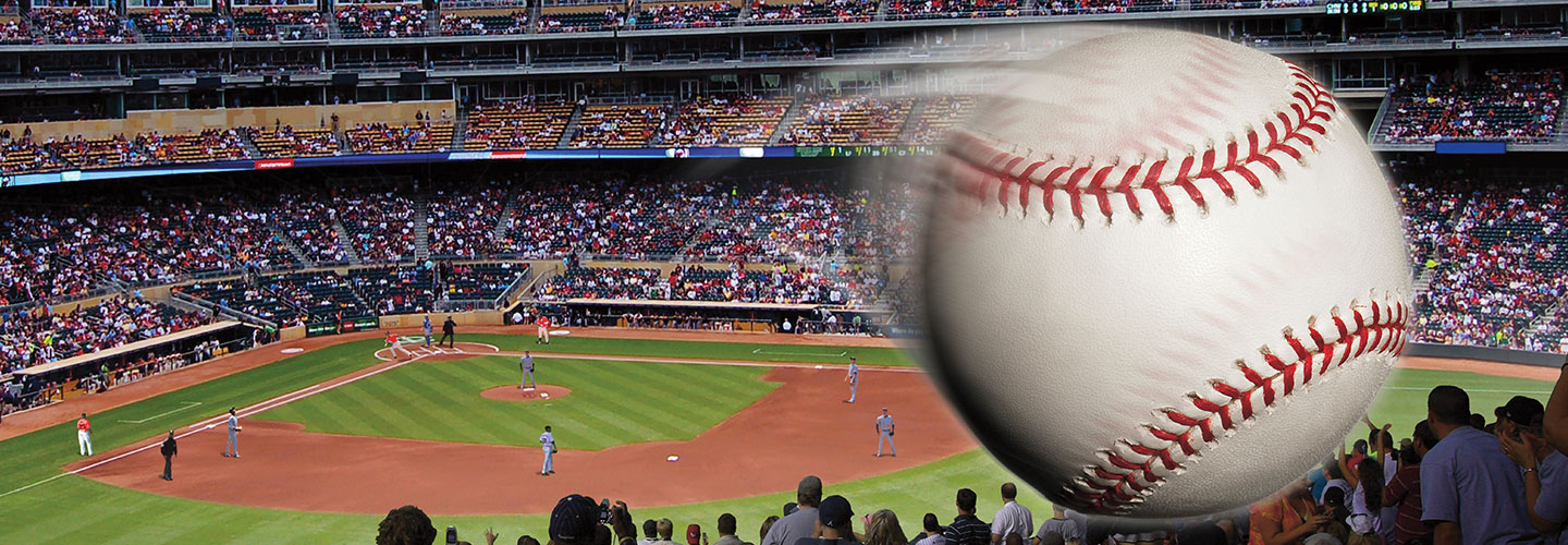 A close up photo of a baseball soaring through the air